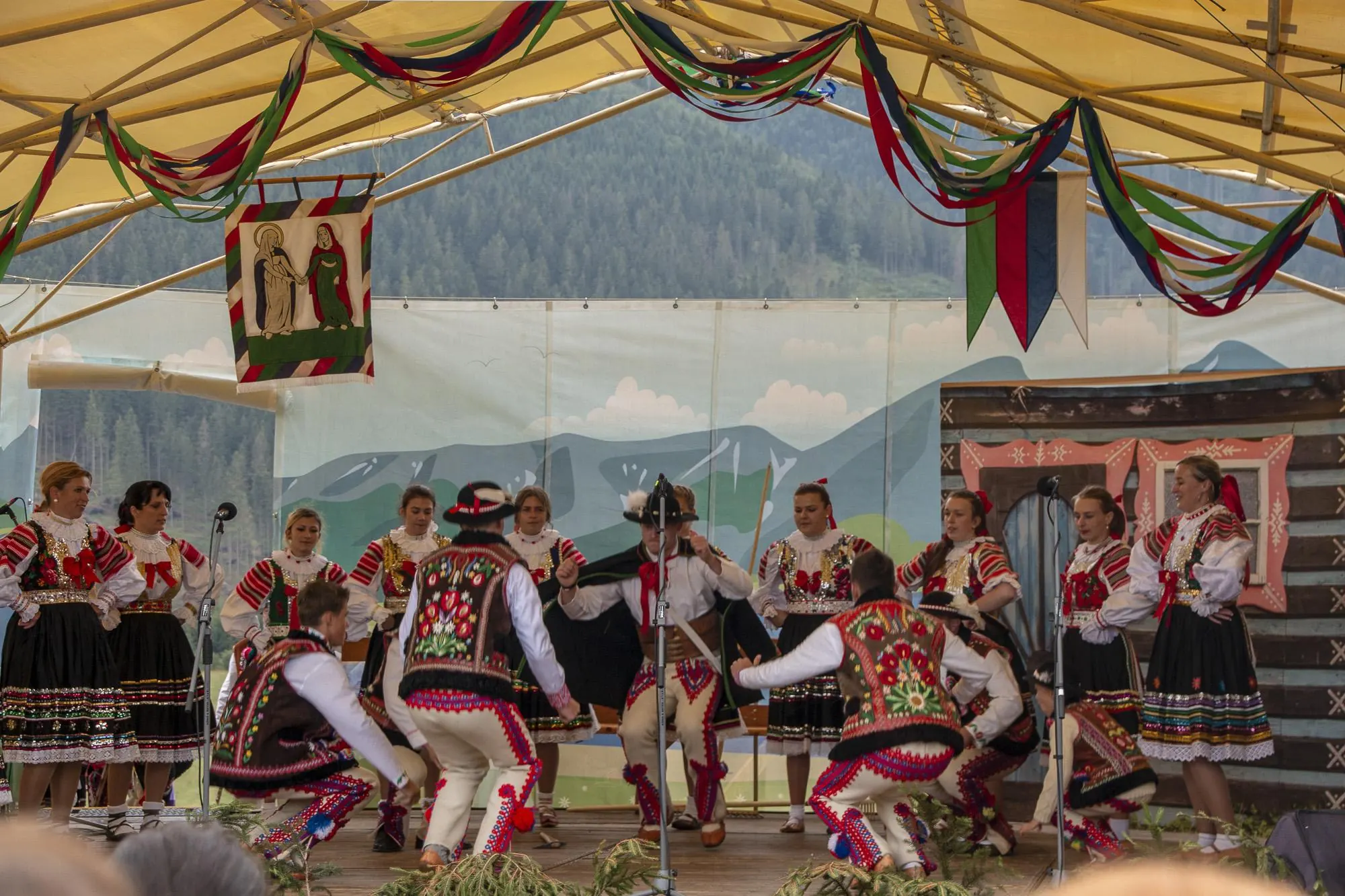 A folk group in Goral costumes on stage at the Goral folklore festival